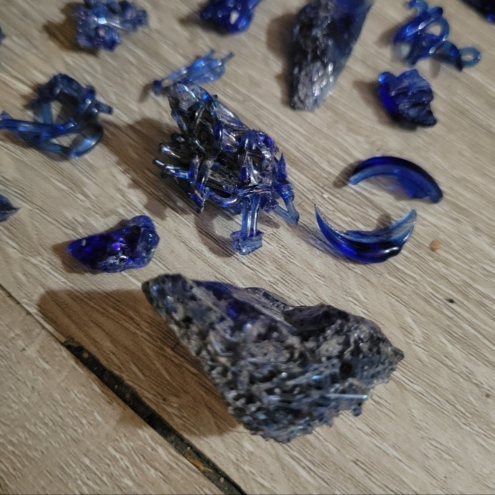 Assorted Cobalt Blue Glass Shards, Differnt Types Of Glass Decor, And Crystals